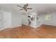 Living room with hardwood floors and an open concept to the kitchen at 114 Glosson Cir, Carrboro, NC 27510