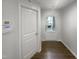 Inviting entryway with hardwood flooring and ample natural light at 6631 Perry Creek Rd, Raleigh, NC 27616
