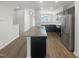 Modern kitchen with granite countertops and island at 6631 Perry Creek Rd, Raleigh, NC 27616