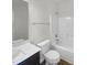 Clean bathroom with tub, toilet and vanity at 6631 Perry Creek Rd, Raleigh, NC 27616