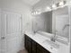 Bathroom with double vanity and large mirror at 6631 Perry Creek Rd, Raleigh, NC 27616
