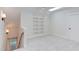 Spacious bonus room with built-in shelving and skylight at 10 Harvest View Way, Franklinton, NC 27525