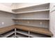 Bright pantry with wood countertop and ample shelving at 10 Harvest View Way, Franklinton, NC 27525