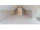 Large bonus room with sloped ceiling and carpet at 10 Harvest View Way, Franklinton, NC 27525