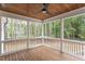Relaxing screened porch with wood flooring and ceiling, offering wooded views at 10 Harvest View Way, Franklinton, NC 27525