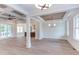 Spacious dining room with hardwood floors and elegant light fixtures at 10 Harvest View Way, Franklinton, NC 27525