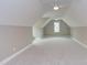 Spacious bonus room featuring a sloped ceiling and carpet at 10 Harvest View Way, Franklinton, NC 27525