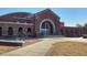 Brick building with arched entryway and camel statue at 22 Capeside Ct, Lillington, NC 27546