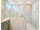 Luxurious shower with marble tile and glass enclosure at 11 Claude Creek Dr, Smithfield, NC 27577