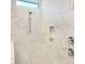 Elegant shower with marble tile and modern fixtures at 11 Claude Creek Dr, Smithfield, NC 27577