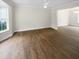 Bright dining room with hardwood floors and large window at 2200 Wild Apple Ct, Apex, NC 27523
