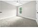 Spacious bedroom with carpeted floors and ceiling fan at 2200 Wild Apple Ct, Apex, NC 27523