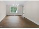 Spacious dining room with hardwood floors and a large window at 2200 Wild Apple Ct, Apex, NC 27523