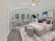Virtually staged main bedroom with a large bed and ample natural light at 1421 Athens Dr, Raleigh, NC 27606