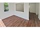 Spare bedroom with hardwood floors and an open concept at 1421 Athens Dr, Raleigh, NC 27606