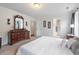 Large main bedroom with a dresser and en-suite bathroom at 135 Deep Creek, Rougemont, NC 27572