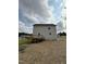 Two-story house with wooden deck and backyard at 153 Wynd Crest Way, Benson, NC 27504
