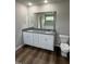 Bathroom with double vanity and granite countertop at 153 Wynd Crest Way, Benson, NC 27504