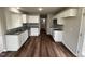 Modern kitchen with white cabinets and granite counters at 153 Wynd Crest Way, Benson, NC 27504