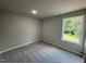 Bright bedroom with neutral walls and carpet at 153 Wynd Crest Way, Benson, NC 27504