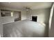 Open living room with a fireplace and kitchen view at 153 Wynd Crest Way, Benson, NC 27504