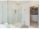 Spa-like bathroom with a large walk-in shower and marble finishes at 2124 Curry Meadow Way, Durham, NC 27703