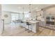 Modern kitchen with island and stainless steel appliances at 2124 Curry Meadow Way, Durham, NC 27703