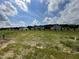 Vacant lot with view of neighboring homes at 66 Tulipfield Way, Benson, NC 27504