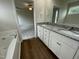 Bathroom with double vanity, granite countertop and separate tub at 66 Tulipfield Way, Benson, NC 27504