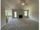 Spacious living room features a fireplace, vaulted ceilings and an open floor plan at 66 Tulipfield Way, Benson, NC 27504