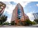 Modern brick building with large windows in a city setting at 122 N Harrington St # 1215, Raleigh, NC 27603