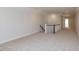 Spacious loft area with carpet flooring and staircase at 143 Traceway N, Sanford, NC 27332