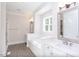Spa-like bathroom with soaking tub, shower, and double vanity at 143 Traceway N, Sanford, NC 27332