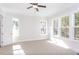 Bright bedroom with carpet flooring and multiple windows at 143 Traceway N, Sanford, NC 27332