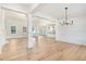 Spacious dining room with hardwood floors and elegant chandelier at 4155 Us-421, Lillington, NC 27546