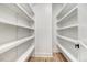 Walk-in pantry with ample shelving for storage at 4155 Us-421, Lillington, NC 27546