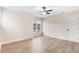 Bright bedroom with hardwood floors and a ceiling fan at 4155 Us-421, Lillington, NC 27546