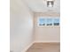 Bedroom with hardwood floors and a window with wooded views at 4155 Us-421, Lillington, NC 27546