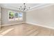 Sunlit office space with hardwood floors and large window at 4155 Us-421, Lillington, NC 27546