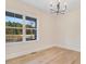 Bright dining room with hardwood floors and a large window at 4155 Us-421, Lillington, NC 27546