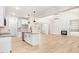 Modern kitchen with white cabinets, granite countertops and stainless steel appliances at 4155 Us-421, Lillington, NC 27546