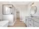 Spa-like bathroom with soaking tub, walk-in shower, and granite vanity at 4155 Us-421, Lillington, NC 27546