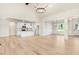 Open concept living space with hardwood floors and a large chandelier at 4155 Us-421, Lillington, NC 27546
