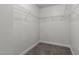 Walk-in closet with wire shelving providing ample storage space at 28 Pepper Ln, Garner, NC 27529