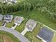 Aerial view of houses, neighborhood, and green space at 28 Pepper Ln, Garner, NC 27529