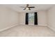 Bright, airy bedroom with neutral walls, carpet, and window with blinds at 2024 Temple Hills Way, Fuquay Varina, NC 27526