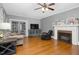 Living Room with hardwood floors, fireplace, and built-in entertainment center at 217 S Walnut St, Spring Hope, NC 27882