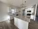 Modern kitchen with white cabinets and granite countertops at 87 Lupin Dr, Smithfield, NC 27577