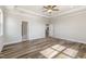 Bright bedroom with wood floors and access to bathroom and kitchen at 7417 Prato Ct, Wendell, NC 27591