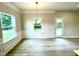 Formal dining room with wainscoting and hardwood flooring at 211 Hopewell Branch Ct, Smithfield, NC 27577